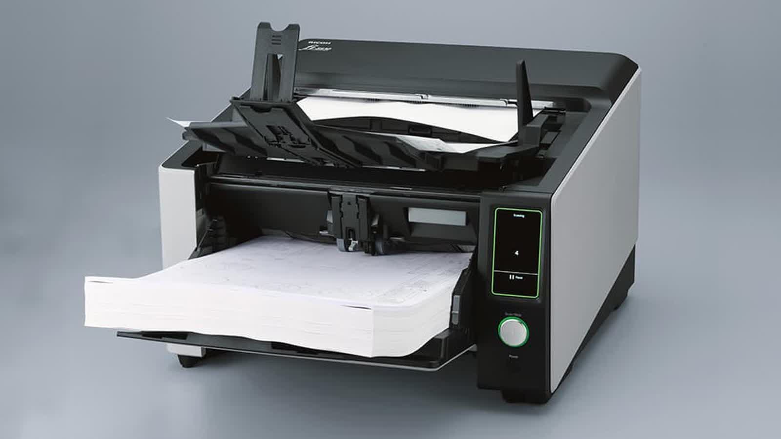 Papers going through a document scanner